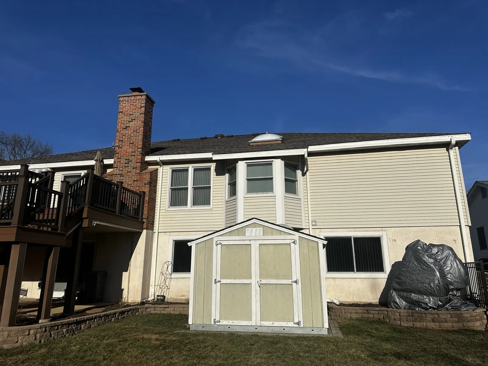 Finished asphalt shingle roof on a two-story home in Chesterfield, MO