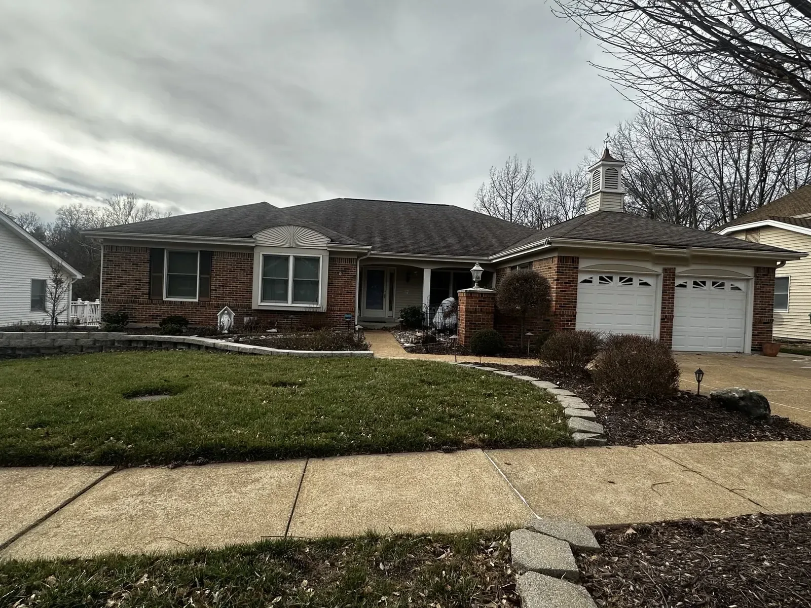 Front of the home in January before the roof replacement